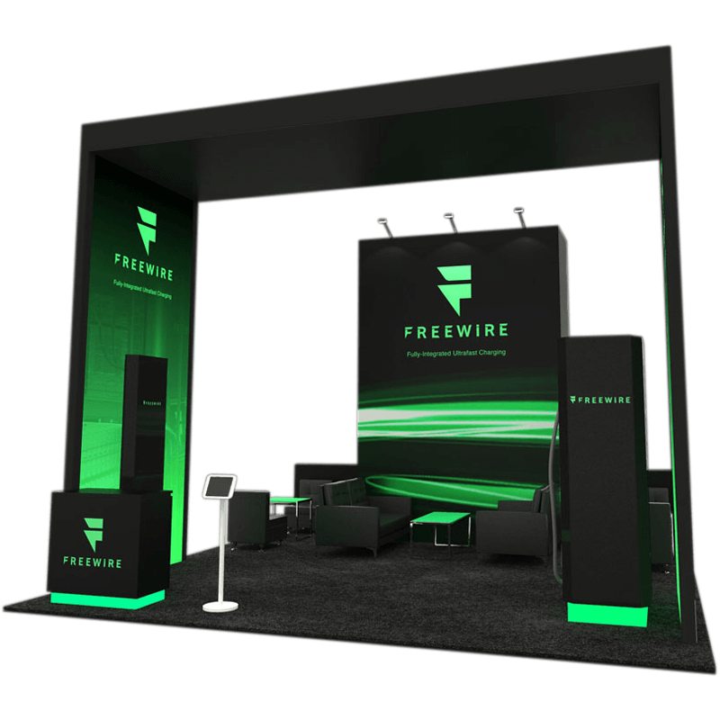 FreeWire 20×20 Booth, featuring a green and black design with a glowing green light in Orlando, FL